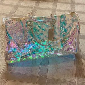 Large holographic transparent bag with a handle and attachable shoulder strap